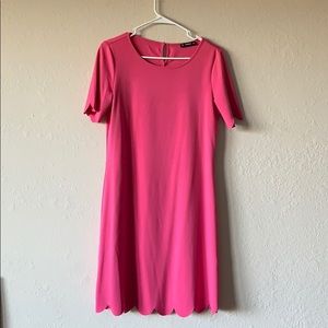 Bright pink shift dress with scallop trim